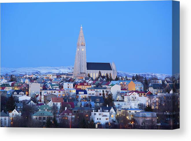 Snow Canvas Print featuring the photograph View Of Hallgrimskirkja Church by Travelpix Ltd