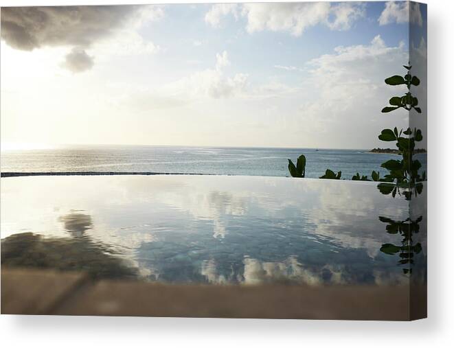 Reflection Canvas Print featuring the digital art View Of Infinity Swimming Pool And Sea, Saint Martin, The Caribbean by Joe Schmelzer
