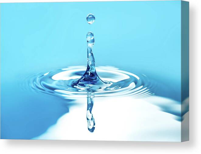 Sparse Canvas Print featuring the photograph Water Drop Collision by Krystiannawrocki