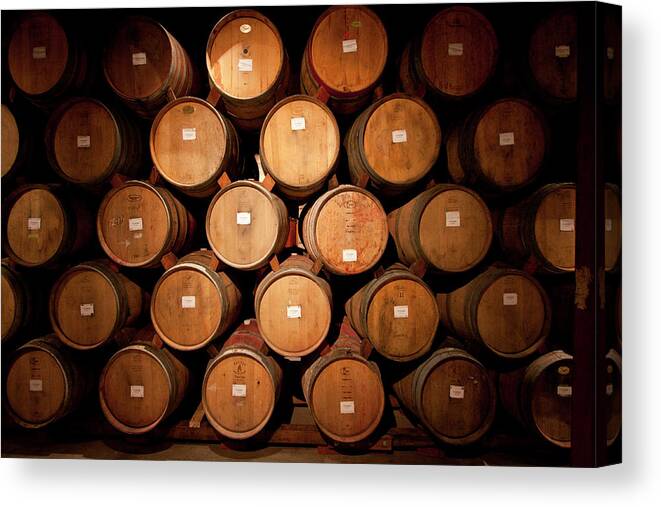 Spot Lit Canvas Print featuring the photograph Wine Barrels by Ryan Mcginnis