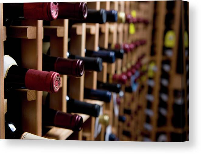 Alcohol Canvas Print featuring the photograph Wine Bottles In Cellar by Markhatfield