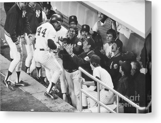Following Canvas Print featuring the photograph Yankees Congratulating Reggie Jackson by Bettmann
