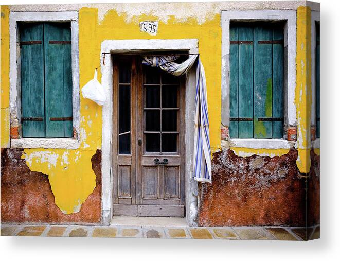 Italy Canvas Print featuring the photograph Yellow Doorway by Nicole Young