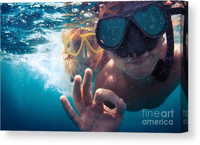 Couple Canvas Print featuring the photograph Young Couple Having Fun Underwater by Dudarev Mikhail
