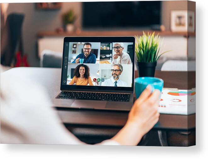 Computer Canvas Print featuring the photograph Business team in video conference #1 by Filadendron