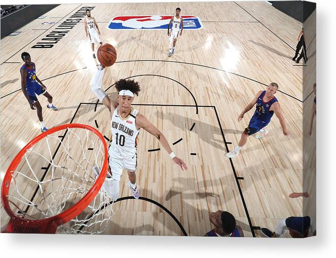 Nba Pro Basketball Canvas Print featuring the photograph Denver Nuggets v New Orleans Pelicans by Joe Murphy