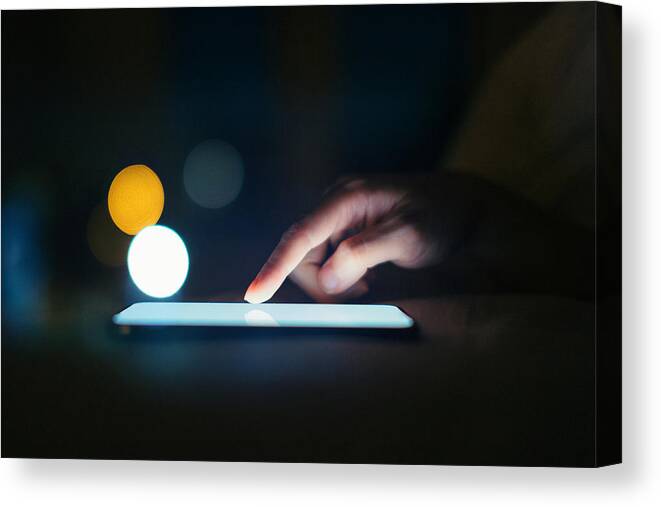 Accessibility Canvas Print featuring the photograph Female Hands Using Smart Phone In The Dark At Night #1 by Oscar Wong