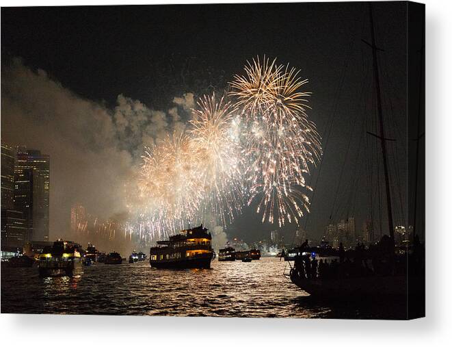 Event Canvas Print featuring the photograph Firework display in New York Bay with boats in the foreground #1 by Photographed by Victoria Phipps ©