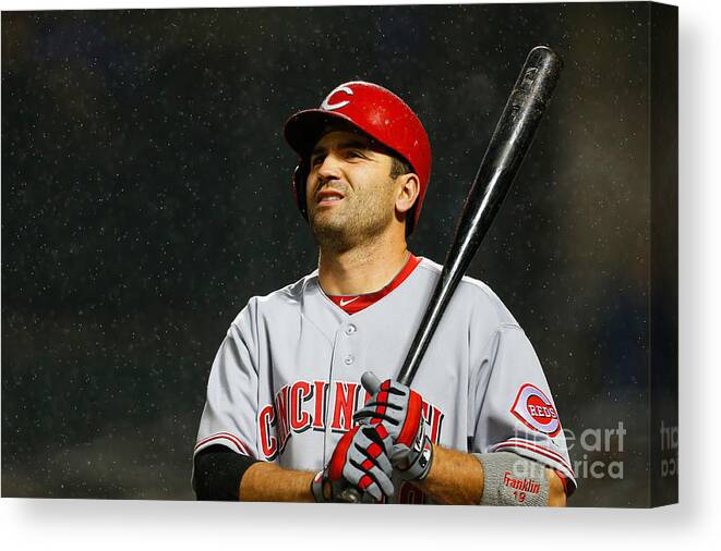 American League Baseball Canvas Print featuring the photograph Joey Votto by Mike Stobe
