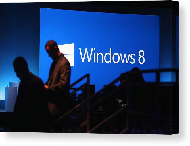 Following Canvas Print featuring the photograph Microsoft Unveils Windows 8 by Mario Tama
