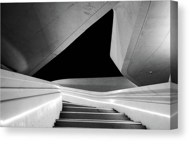 Futuristic Building Canvas Print featuring the photograph Modern architecture and empty staircase leading to a bright open space. by Michalakis Ppalis