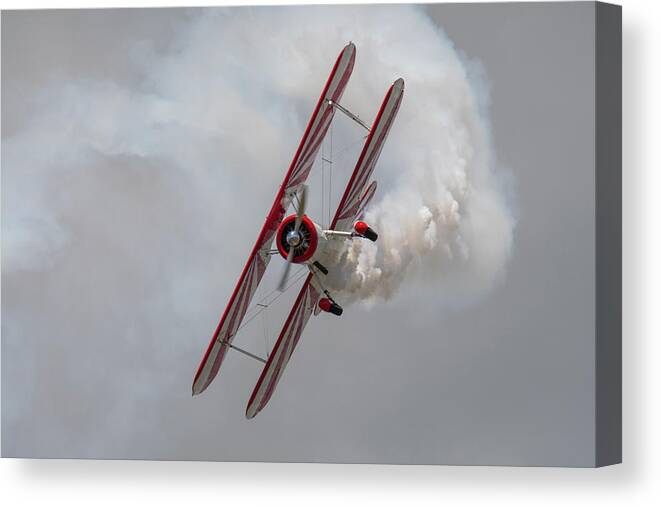 Red Canvas Print featuring the photograph Red and White Airplane #2 by Carolyn Hutchins