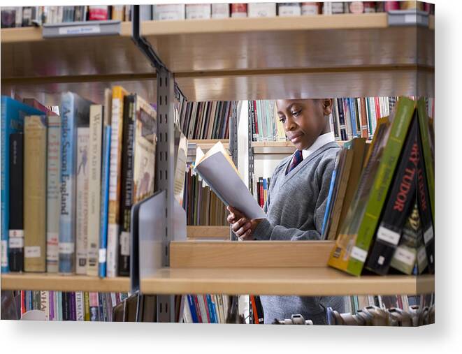 Education Canvas Print featuring the photograph Student in library #1 by David Leahy