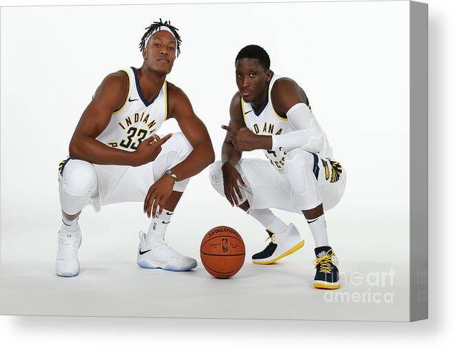 Media Day Canvas Print featuring the photograph Victor Oladipo and Myles Turner by Ron Hoskins