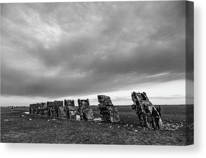 Cars Buried Canvas Print featuring the photograph Cadillac Ranch on Historic Route 66 in Amarillo Texas in black and white #10 by Eldon McGraw