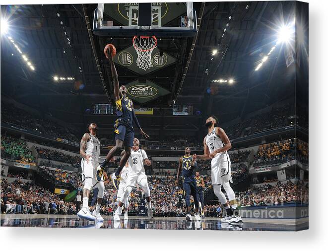 Nba Pro Basketball Canvas Print featuring the photograph Victor Oladipo by Ron Hoskins