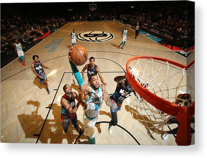 Nba Pro Basketball Canvas Print featuring the photograph Charlotte Hornets v Brooklyn Nets #2 by Nathaniel S. Butler