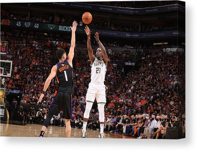 Playoffs Canvas Print featuring the photograph Jrue Holiday by Nathaniel S. Butler