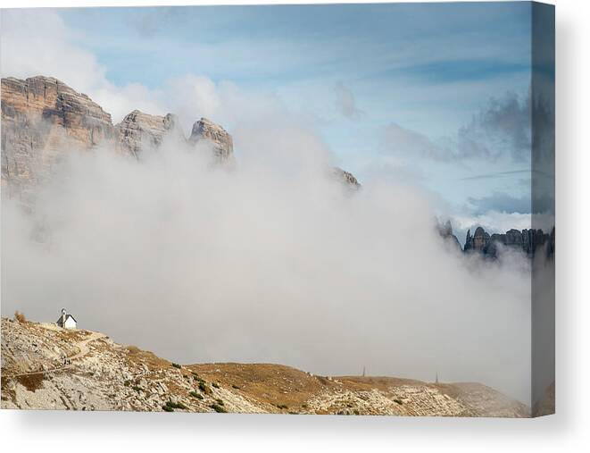 Tre Cime Canvas Print featuring the photograph Mountain landscape with fog in autumn. Tre Cime dolomiti Italy. by Michalakis Ppalis