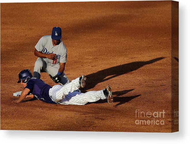 Game Two Canvas Print featuring the photograph Nick Hundley and Jimmy Rollins #2 by Doug Pensinger