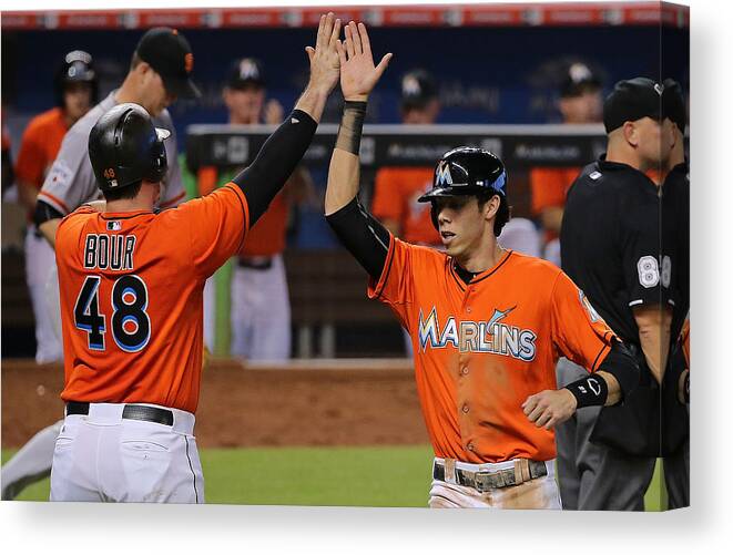 People Canvas Print featuring the photograph Christian Yelich #3 by Mike Ehrmann