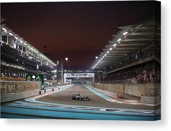 Mercedes Amg Petronas Formula One Team Canvas Print featuring the photograph F1 Grand Prix of Abu Dhabi #3 by Paul Gilham