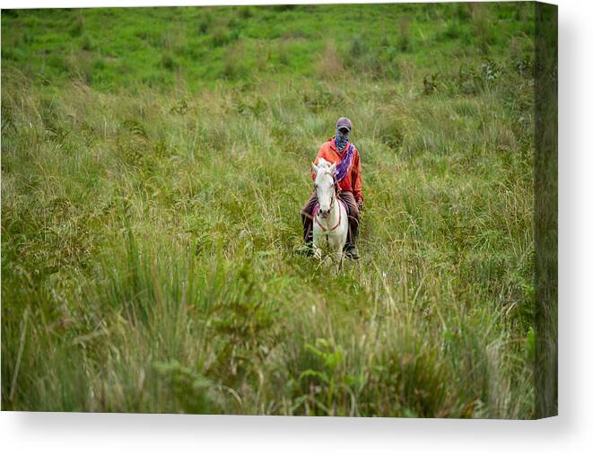 Horse Canvas Print featuring the photograph Unidentified local people or Bromo Horseman at the mountainside of Mount Bromo, Semeru, Tengger National Park, East Java of Indonesia. #3 by Shaifulzamri