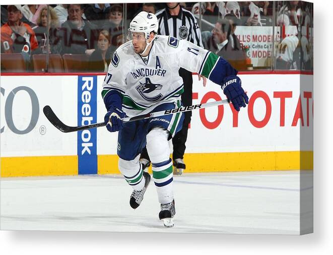 National Hockey League Canvas Print featuring the photograph Vancouver Canucks v Philadelphia Flyers #3 by Jim McIsaac