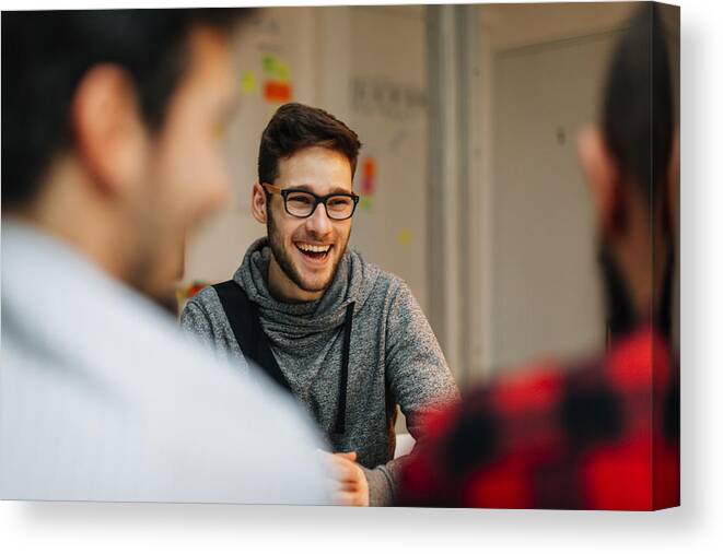 New Business Canvas Print featuring the photograph Young man at a job interview. #3 by Vgajic