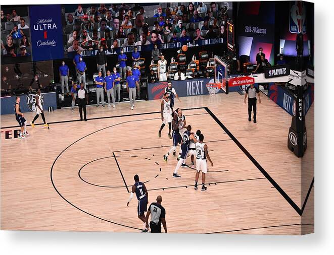 Luka Doncic Canvas Print featuring the photograph Los Angeles Clippers v Dallas Mavericks - Game Four #4 by David Dow