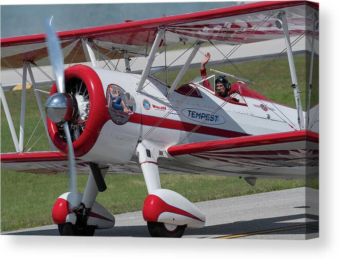 Red Canvas Print featuring the photograph Red and White Airplane by Carolyn Hutchins