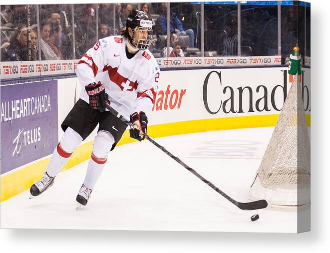 People Canvas Print featuring the photograph Switzerland V Germany - Relegation - 2015 IIHF World Junior Championship #5 by Dennis Pajot