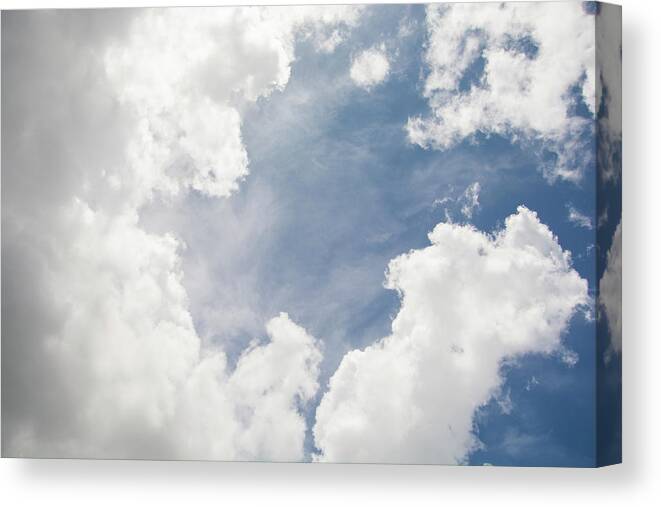 Sky Canvas Print featuring the photograph Cloudscape by Carolyn Hutchins