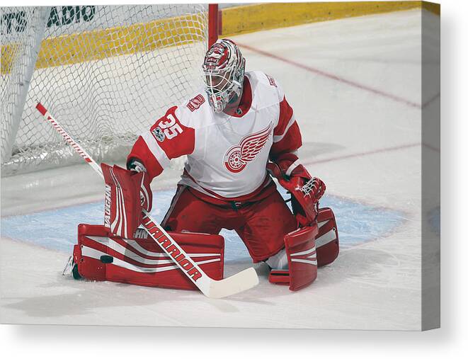 People Canvas Print featuring the photograph Detroit Red Wings v Florida Panthers #6 by Joel Auerbach