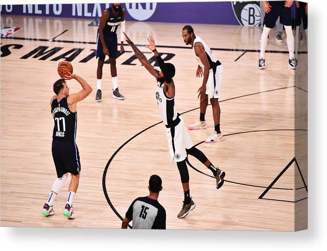 Playoffs Canvas Print featuring the photograph Los Angeles Clippers v Dallas Mavericks - Game Four by David Dow
