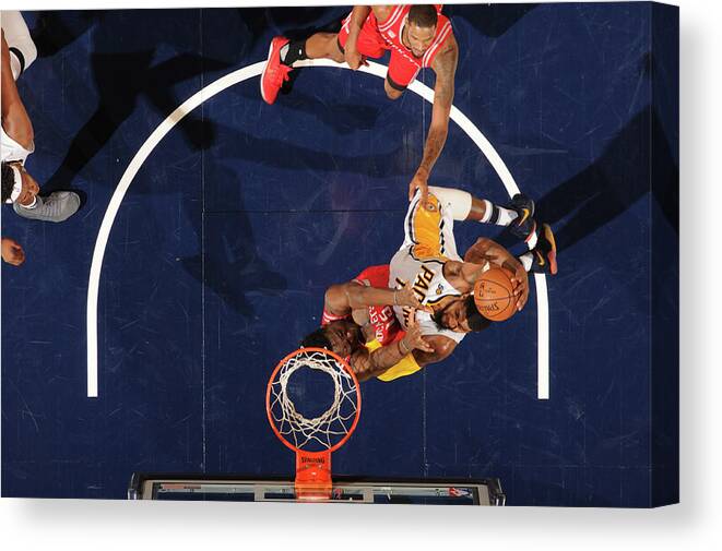 Nba Pro Basketball Canvas Print featuring the photograph Paul George by Ron Hoskins