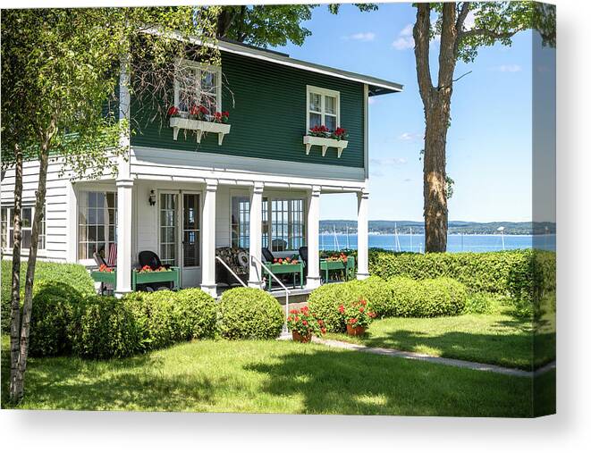 Bay View Canvas Print featuring the photograph A Cottage on the Bay by Robert Carter