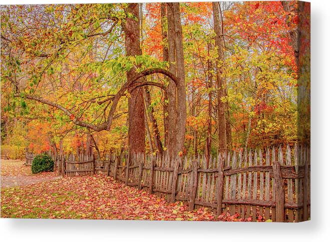 Oconaluftee Canvas Print featuring the photograph A Crooked Old Fence in the Shadow of Fall by Marcy Wielfaert