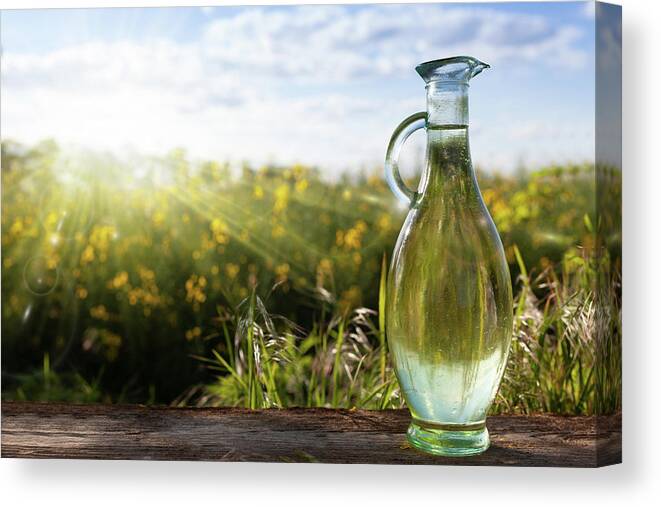 [therapy Canvas Print featuring the pyrography A healthy and natural drink against the backdrop of nature. by Adam Nowak