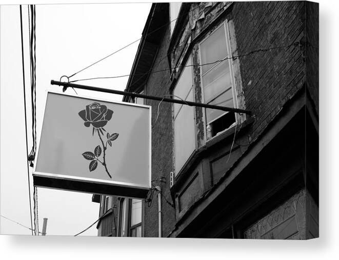 Urban Canvas Print featuring the photograph A Rose Sign by Kreddible Trout