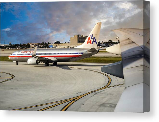 American Canvas Print featuring the photograph AA Boeing 737 by Chris Smith