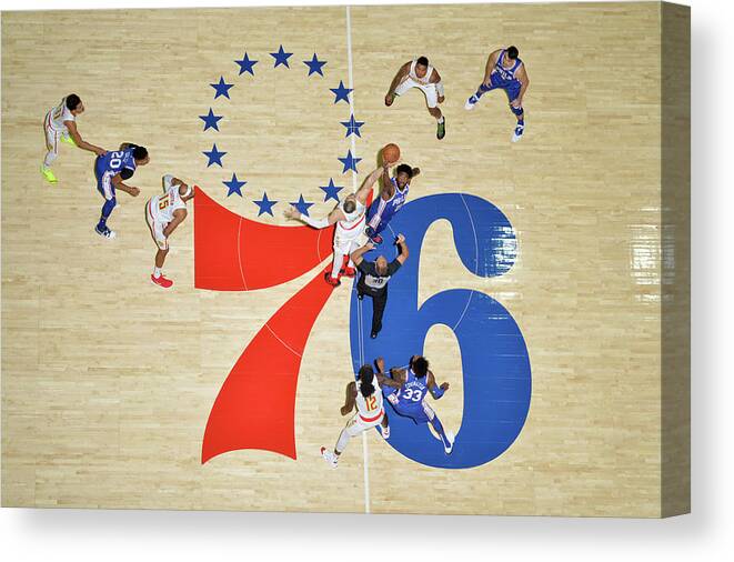 Nba Pro Basketball Canvas Print featuring the photograph Alex Len and Joel Embiid by Jesse D. Garrabrant