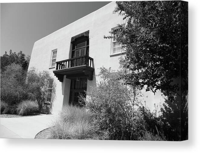 University Of New Mexico Lobos Canvas Print featuring the photograph Alumni chapel on the campus of the University of New Mexico in black and white by Eldon McGraw