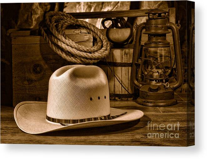 Cowboy Canvas Print featuring the photograph American West Rodeo Cowboy Hat - Sepia by Olivier Le Queinec