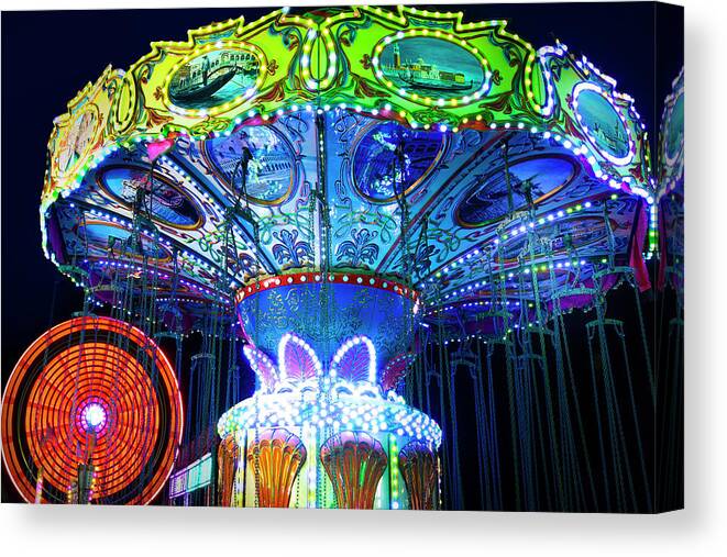 Swing Ride Canvas Print featuring the photograph An Evening at the County Fair by Mark Andrew Thomas