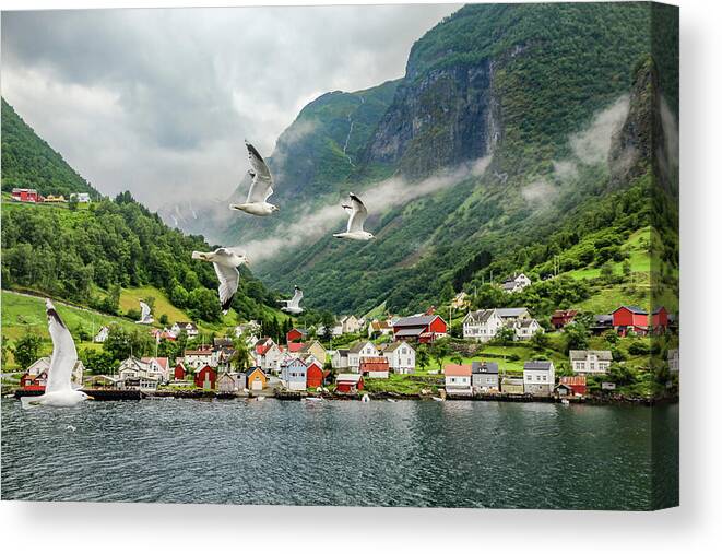 Norway Canvas Print featuring the photograph An Idyllic Village On The Edge Of A Fjord by Elvira Peretsman