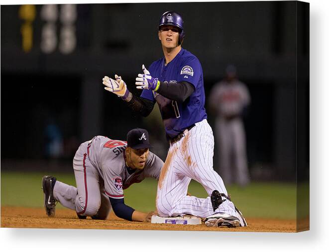 Celebration Canvas Print featuring the photograph Andrelton Simmons and Brandon Barnes by Justin Edmonds