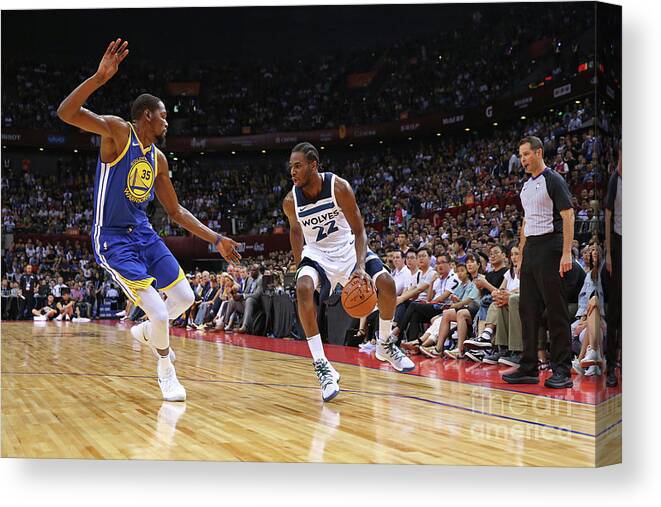 Andrew Wiggins Canvas Print featuring the photograph Andrew Wiggins and Kevin Durant by David Sherman