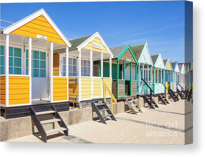 Southwold Canvas Print featuring the photograph Beach huts, Southwold, England by Neale And Judith Clark