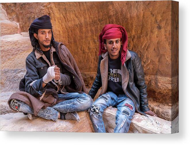 Bedouins Canvas Print featuring the photograph Bedouins in the ancient city of Petra by Dubi Roman